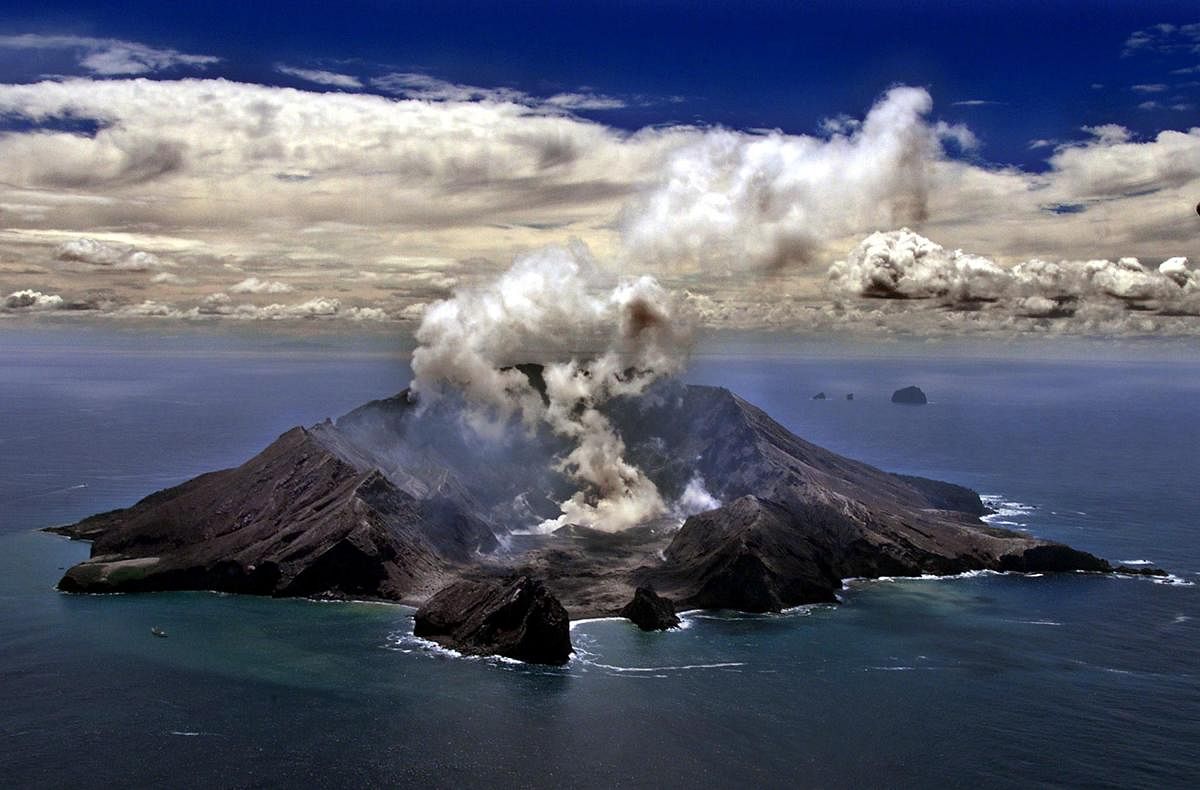 New Zealand's most active volcano on White Island in the Bay of Plenty giving off dense plumes of steam and gas. (AFP Photo)