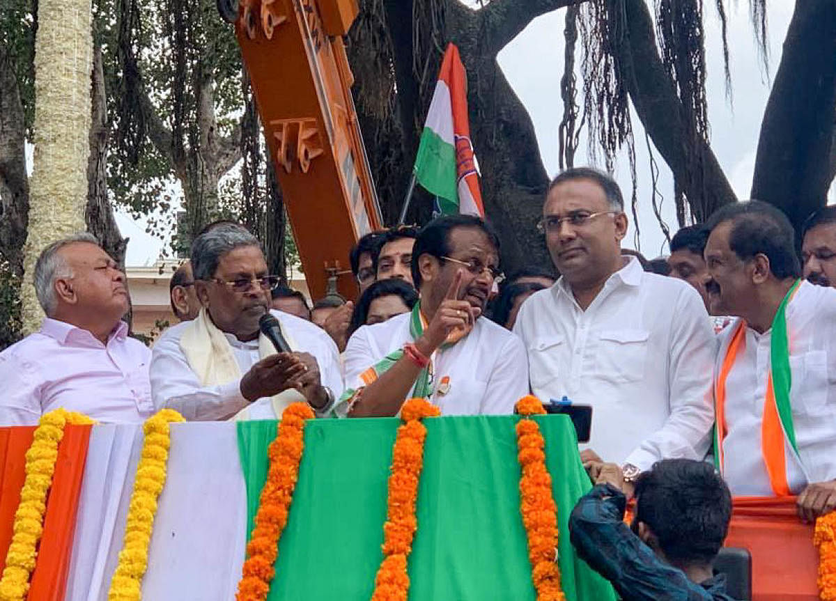 Opposition Leader Siddaramaiah, KPCC President Dinesh Gundurao, Former Minister Ramalinga Reddy and KJ George campaign for KR Pura Constituency Congress candidate M Narayanaswamy, at KR Pura, in Bengaluru on Sunday.