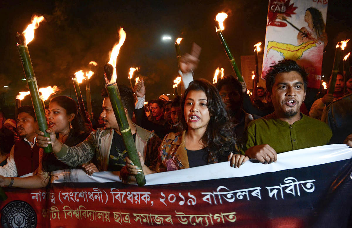 Gauhati University students protest against the Citizenship (Amendment) Bill at Jalukbari in Assam on Monday. PTI