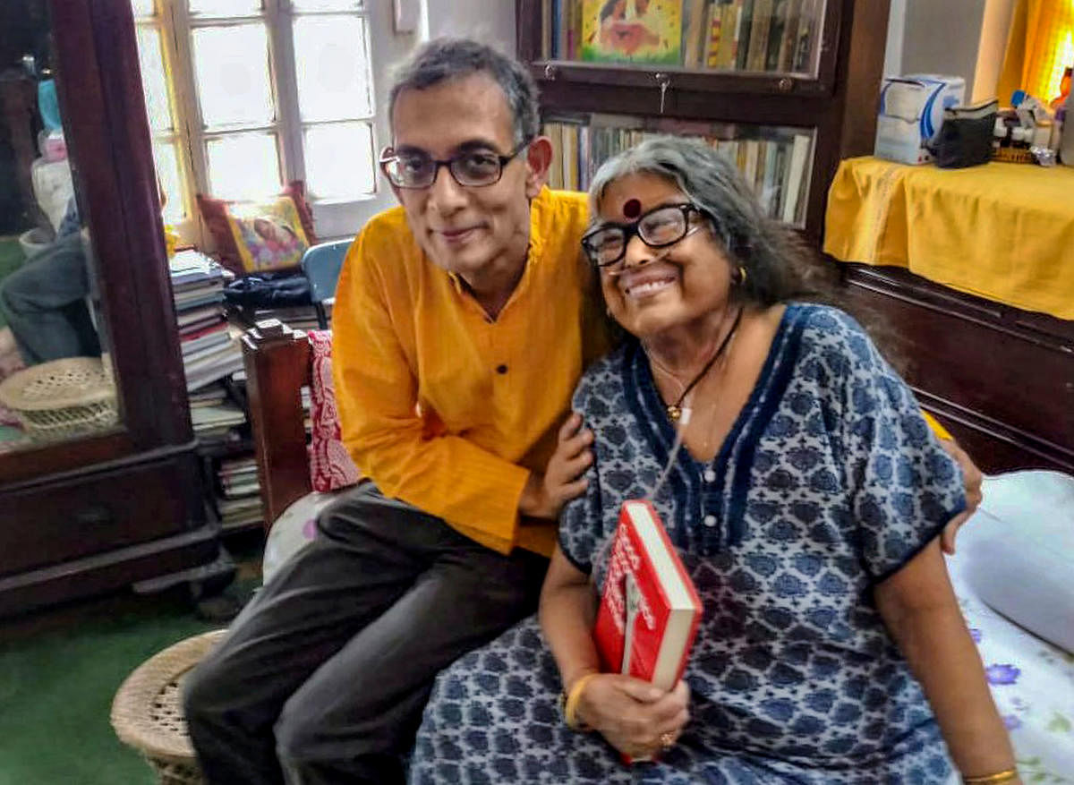 Indian-American Nobel laureate Abhijit Banerjee meets award-winning novelist and poet Nabaneeta Dev Sen at her residence, in Kolkata, Tuesday, Oct. 22, 2019. (PTI Photo)