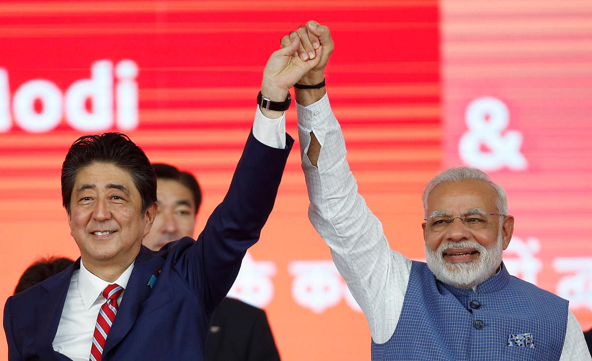 Japanese Prime Minister Shinzo Abe  and Indian Prime Minister Narendr aModi (Reuter File Photo)