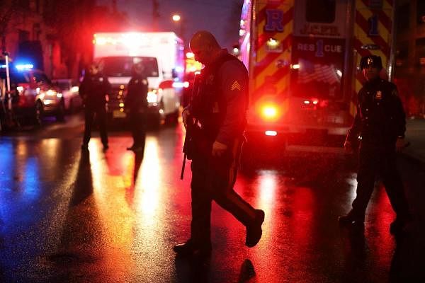 Shootout and standoff with two gunman in Jersey City leaves multiple people dead. (AFP photo)