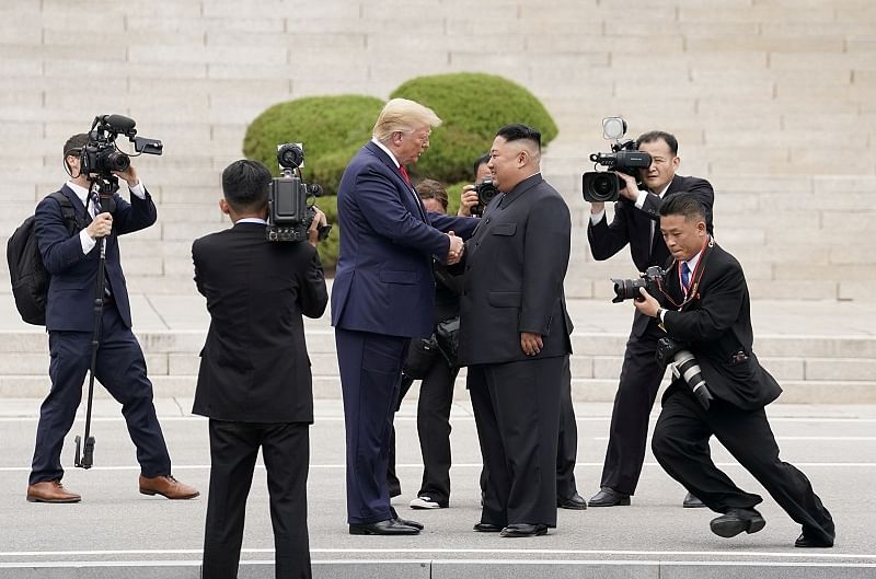 U.S. President Donald Trump meets with North Korean leader Kim Jong Un at the demilitarized zone separating the two Koreas, in Panmunjom, South Korea. (Reuters Photo)