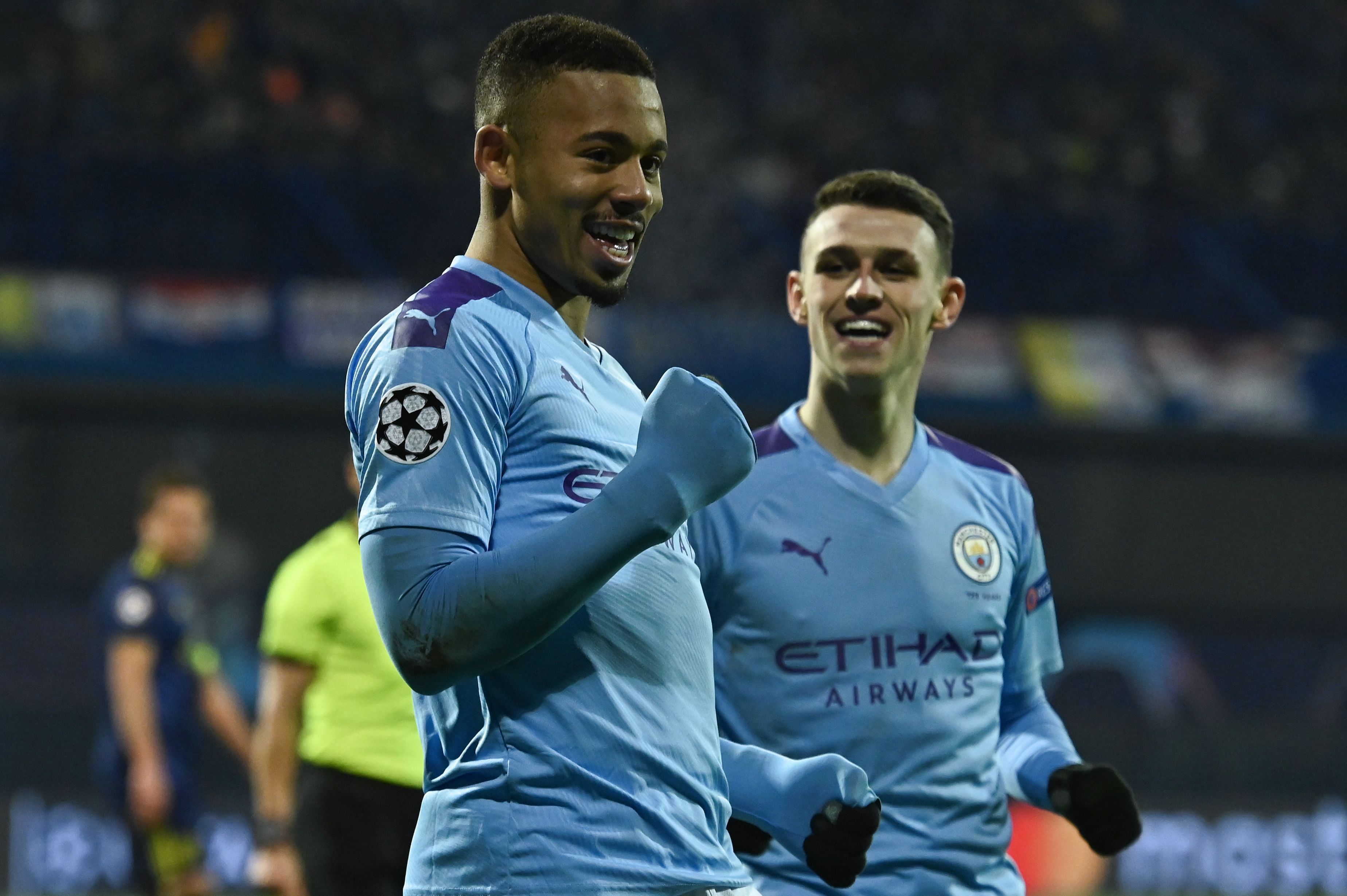 Manchester City's Brazilian striker Gabriel Jesus (L) celebrates after scoring a goal during the UEFA Champions League Group C football match between GNK Dinamo Zagreb and Manchester City FC at the Maksimir Stadium in Zagreb. (AFP Photo)