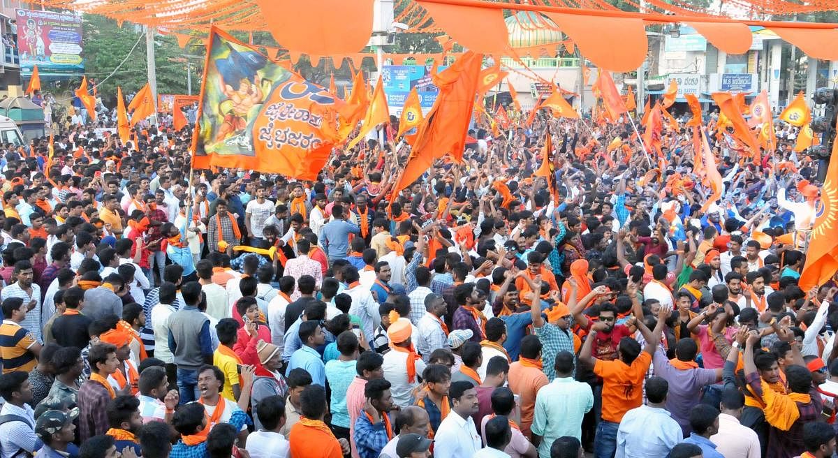 Devotees take part in Shobhayatre held as a part of Datta Jayanti at Hanumanthappa Circle. DH Photo