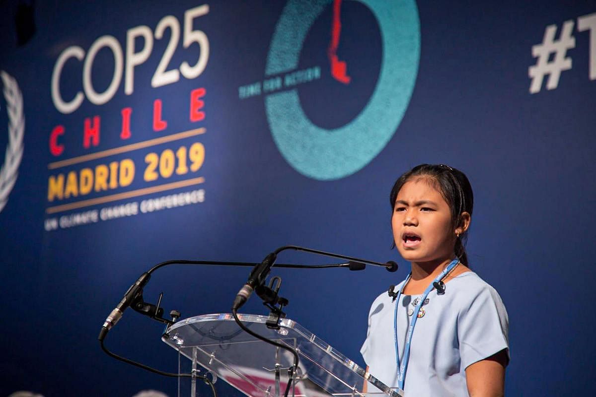 Eight-year-old Licypriya Kangujam from Manipur speaks at the Climate Summit in Madrid, Spain. Photo by PTI.