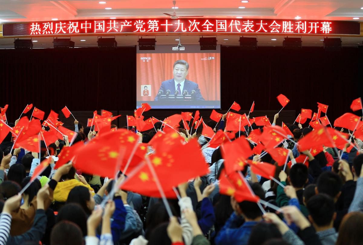 Chinese leaders are trying to support growth to limit job losses that could affect social stability, but are facing pressure to tackle debt risks caused by pump-priming policies. Photo/AFP