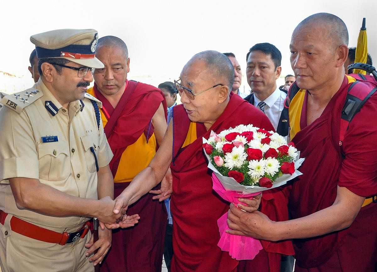 Hubballi: Tibetan spiritual leader Dalai Lama being welcomed at the airport in Hubballi, Thursday, Dec. 12, 2019. (PTI Photo)