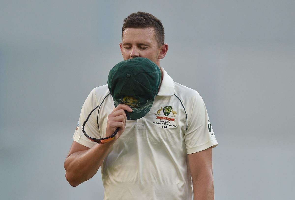 Australia's Josh Hazlewood walks off the field after pulling up injured on day two of the first Test cricket match between Australia and New Zealand at the Perth Stadium in Perth. (AFP file photo)
