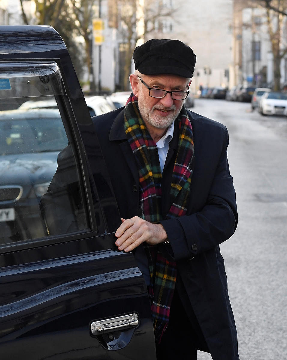 Britain's Labour Party leader Jeremy Corbyn gets out of a taxi near his home in London, Britain. Reuters
