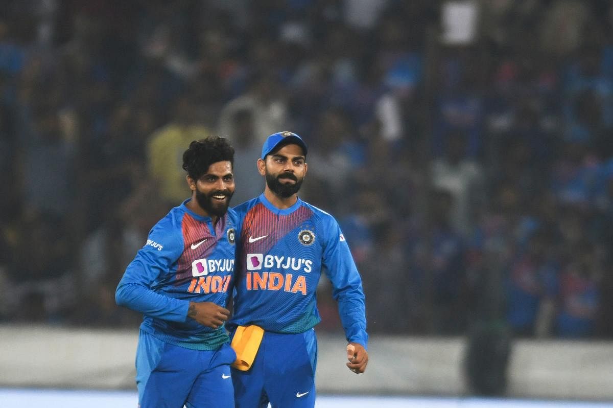 "The people sitting on the TV outside cannot tell the fielders to then tell the umpire to review it again. I've never seen that happen in cricket," said Kohli following India's eight-wicket loss. (Photo by AFP)
