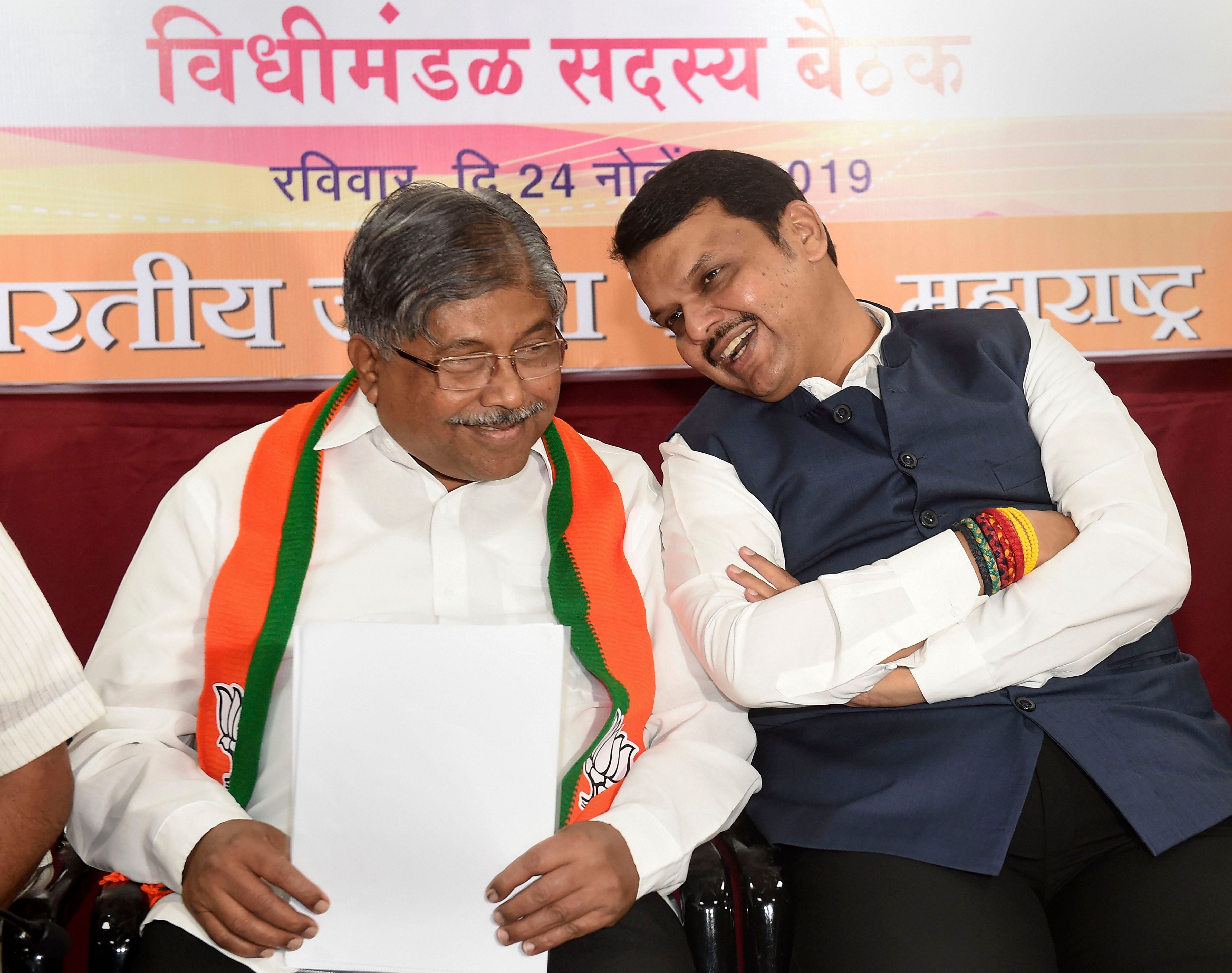 BJP Maharashtra President Chandrakant Patil and BJP leader Devendra Fadnavis. (PTI Photo)