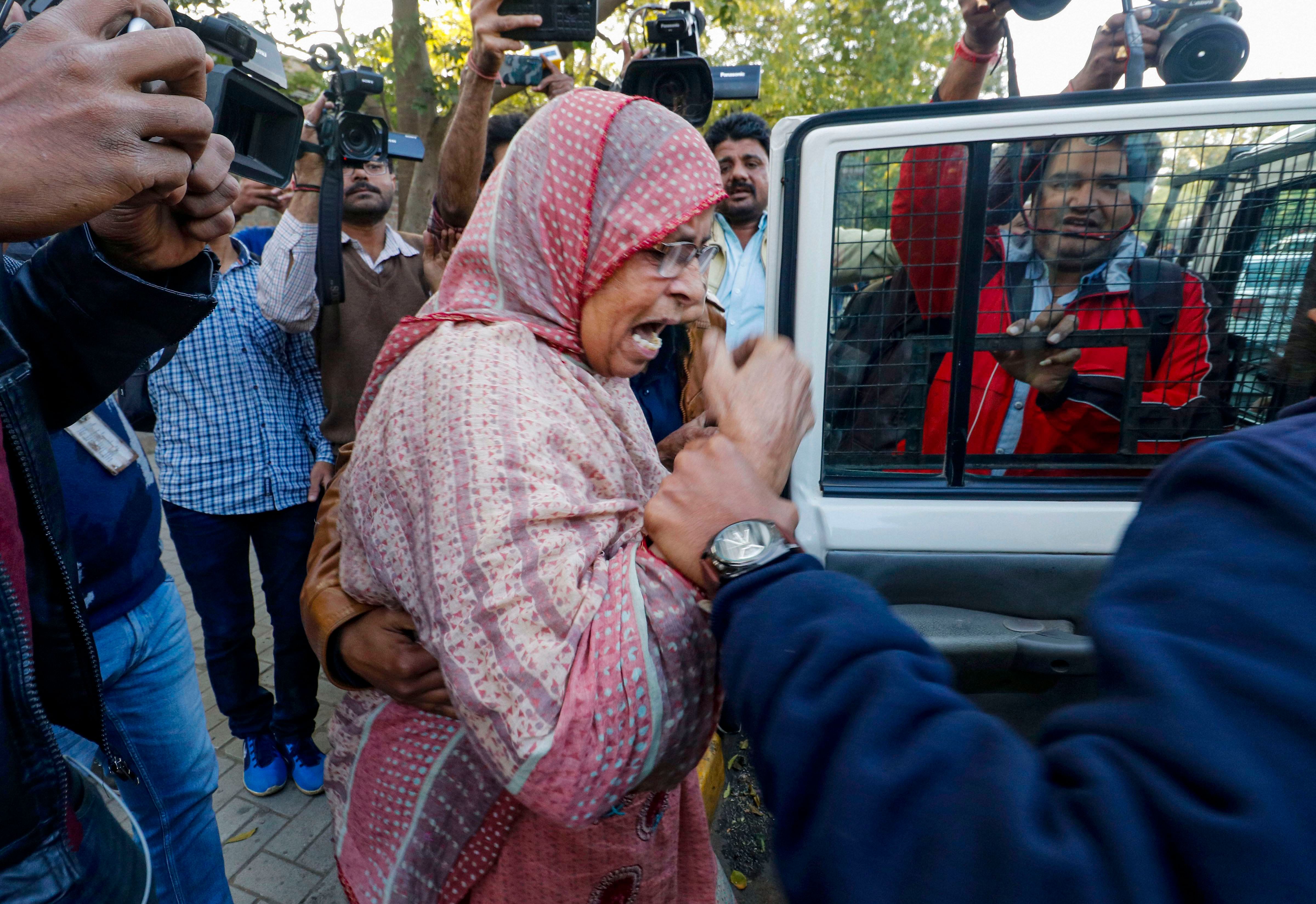  Police detain a demonstrator during a protest to show solidarity with the students of Delhi's Jamia Millia Islamia who are agitating over the Citizenship Amendment Act, in Ahmedabad. (PTI Photo)