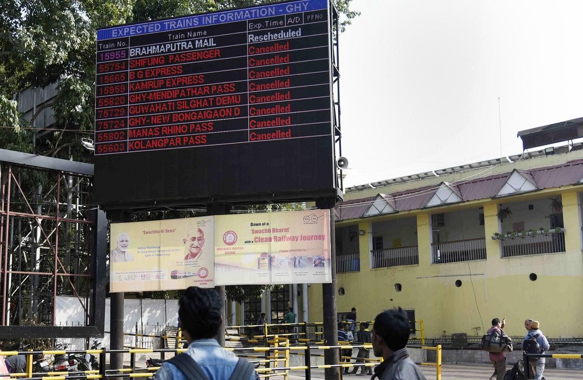 An electronic displays at Guwahati railway station show a list trains which were cancelled due to anti-Citizenship (Amendment) Act protest, in Guwahati, Saturday, Dec. 14, 2019. (PTI Photo) 