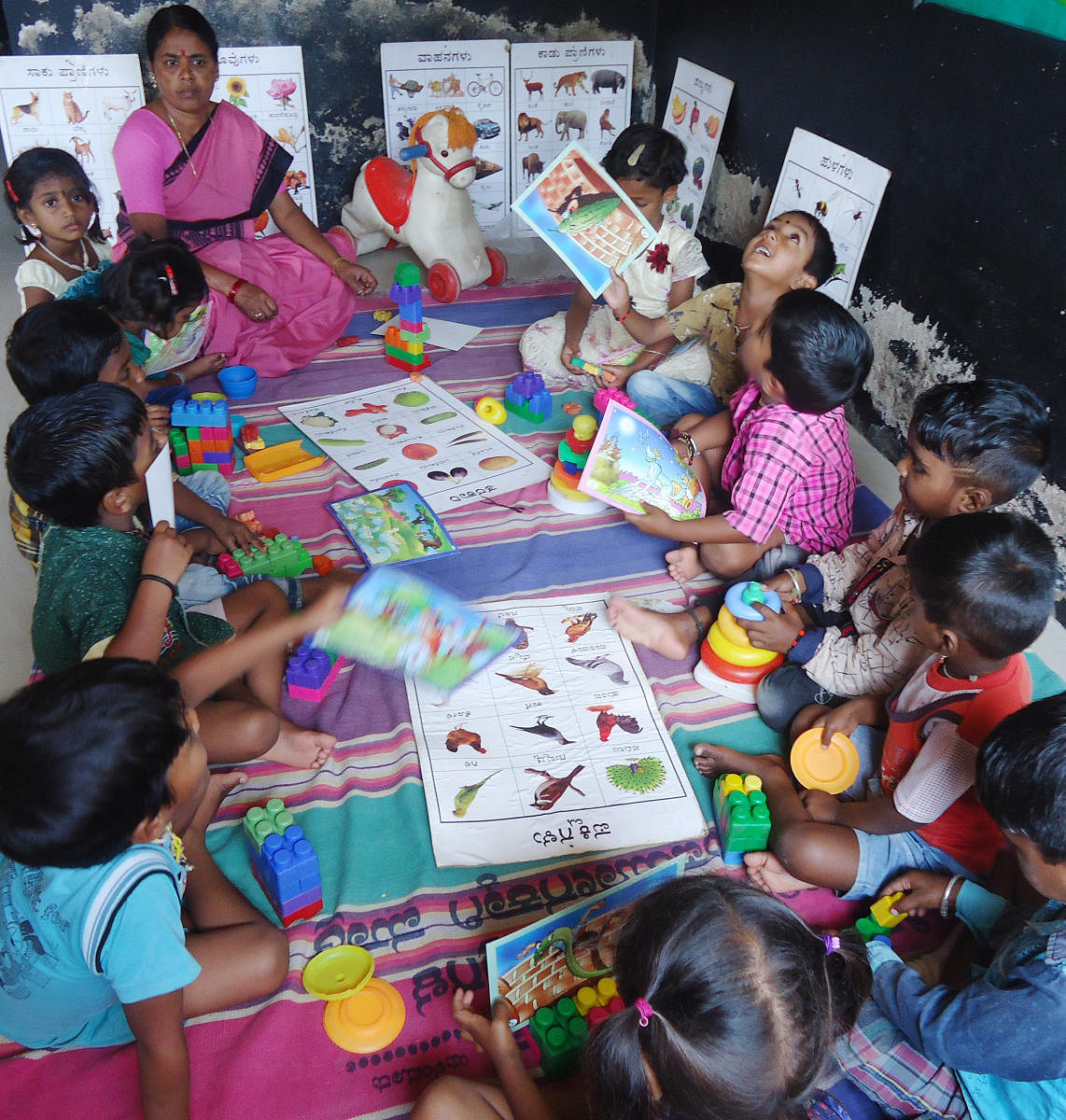 The objective is to make anganwadi centres interactive and "more child-friendly" by providing additional facilities like creche as well as smart teaching and learning aid. DH Photo