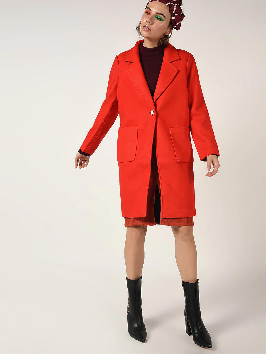 Make a statement this season with a bold red overcoat.