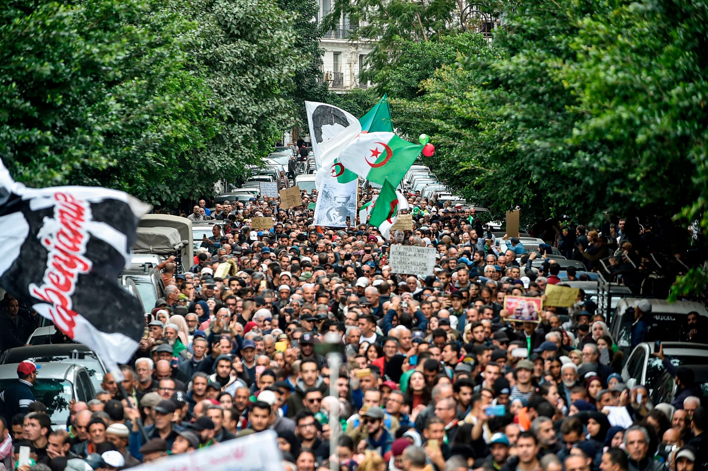 People gather for a mass anti-government demonstration in the centre of the Algerian capital Algiers. (AFP Photo)