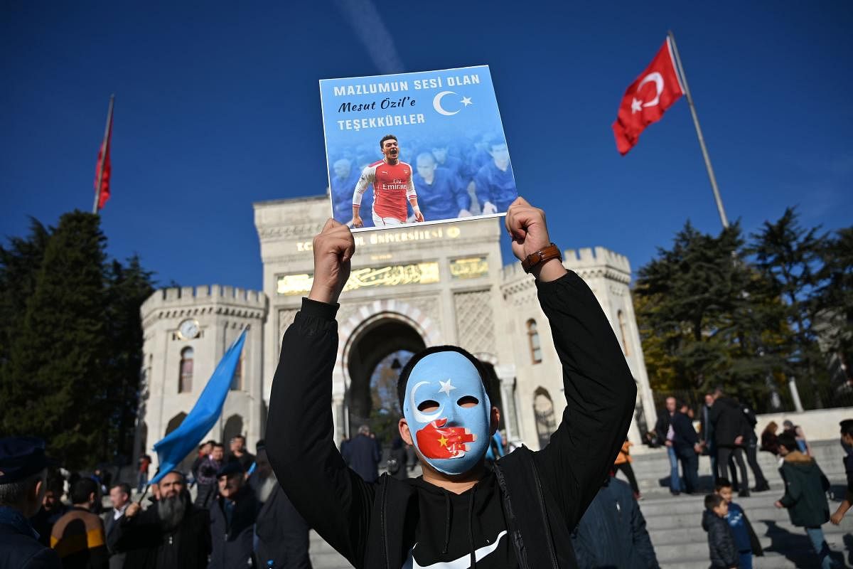 Arsenal footballer Mesut Ozil, a German national of Turkish origin, tweeted that the Muslim world has been silent on the plight of the Uighurs in a message on the flag of "East Turkestan," which Uighur separatists call the western Chinese region of Xinjiang. Photo/AFP
