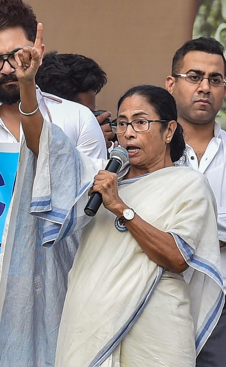 Kolkata: West Bengal Chief Minister Mamata Banerjee addresses a protest rally against NRC and Citizenship Amendment Act, in Kolkata, Monday, Dec. 16, 2019. (PTI Photo)