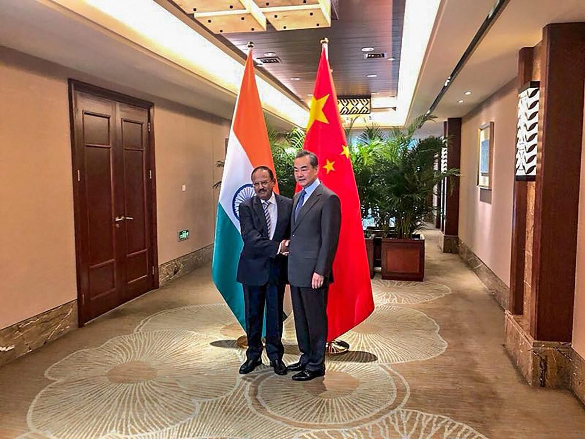 The Chinese delegation will be led by its Foreign Minister Wang Yi, while National Security Advisor Ajit Doval will head the Indian team at the boundary talks beginning on Saturday. Photo/PTI