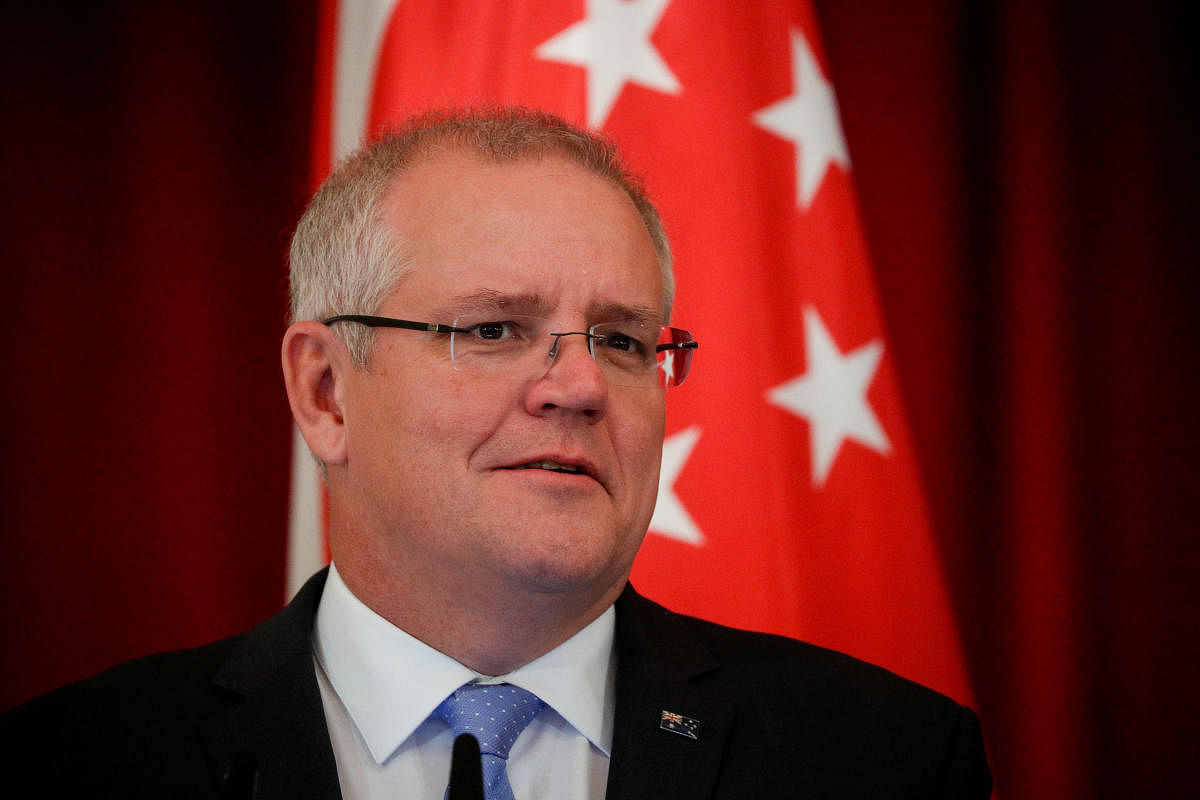 Morrison expressed regret for the family trip as two volunteer firefighters were killed and a record heatwave exacerbated dozens of out-of-control blazes. Photo/REUTERS