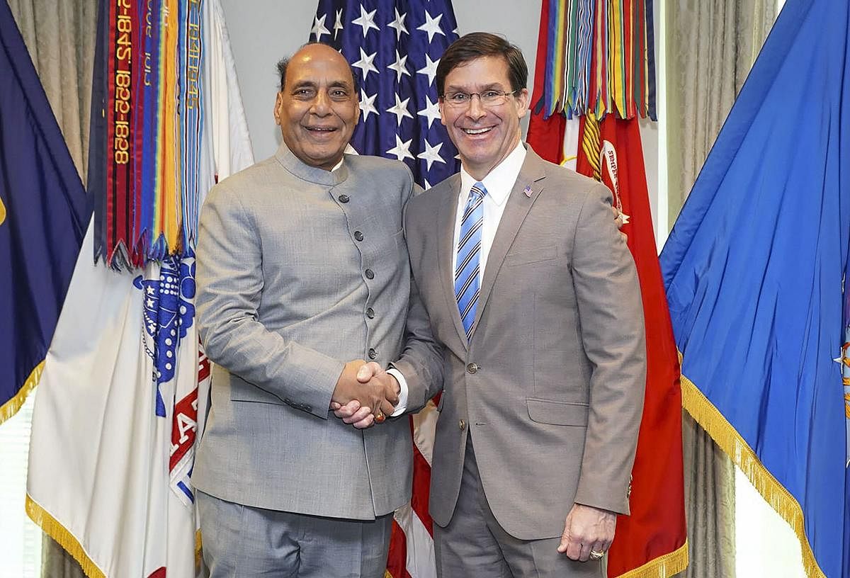 Defence Minister Rajnath Singh shakes hands with US Secretary of Defense Mark Esper before their bilateral meeting in Washington, Wednesday, Dec. 18, 2019. (PTI Photo)