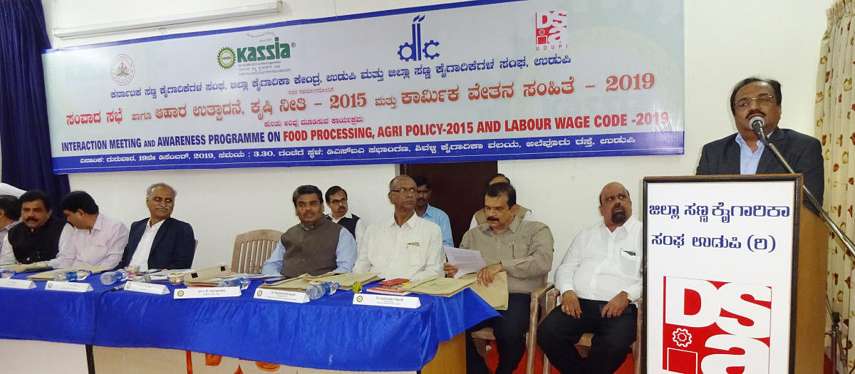 Directorate of MSME Director S Ziyaullah speaks at an interactive session on 'Food Processing, Agri Policy, and Labour Wage Code 2019' at District Small Industries Association in Udupi on Thursday.