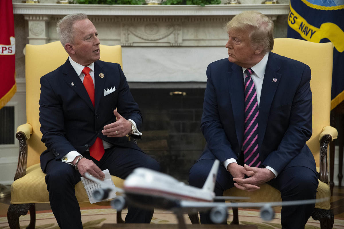 President Donald Trump meets with Rep. Jeff Van Drew, D-N.J., who is planning to switch his party affiliation, in the Oval Office of the White House. Photo/AP