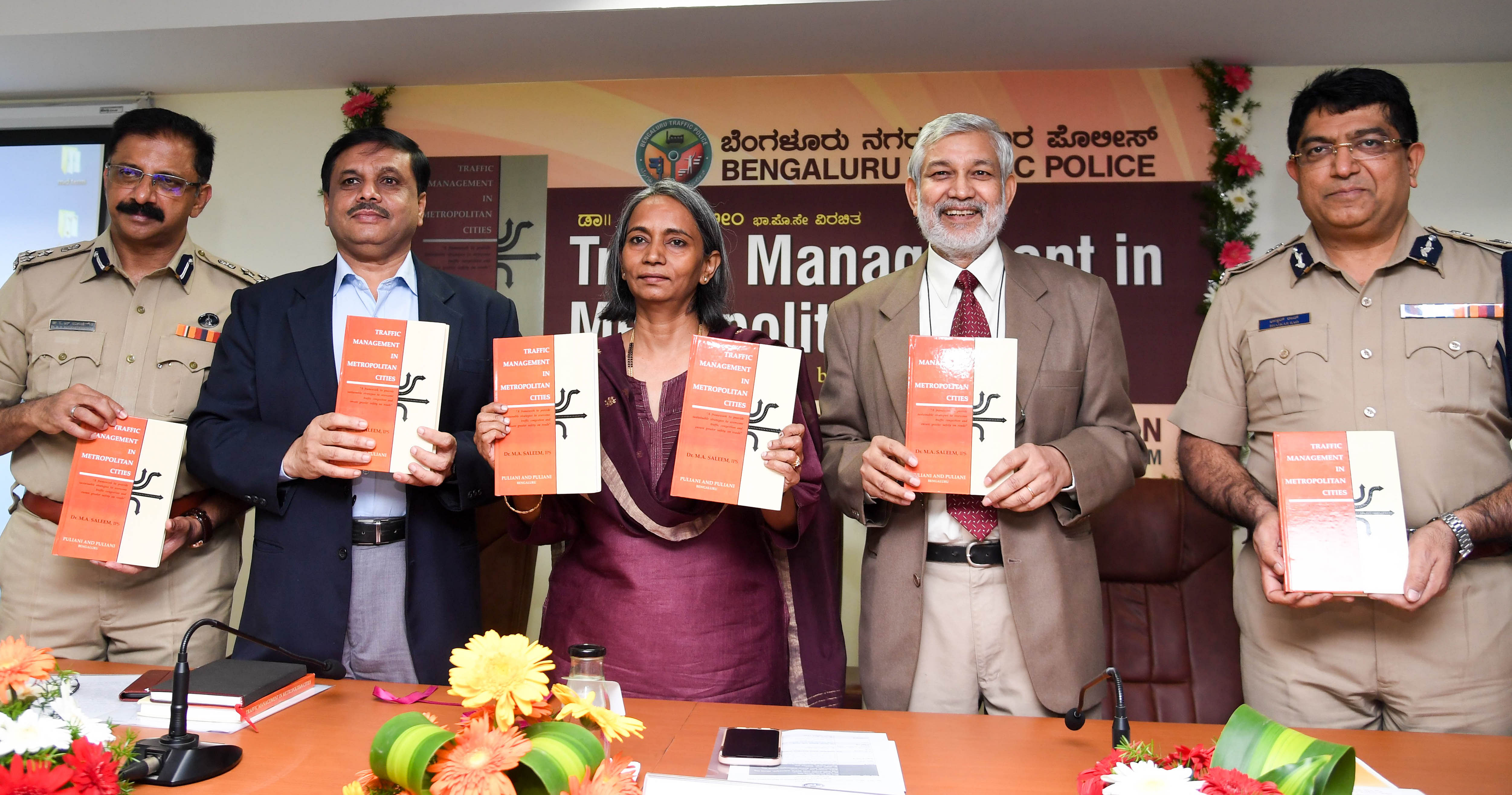 Neelamani N. Raju, DG & IGP release the book ‘ Traffic Management in Metropolitan Cities’, author by Dr M A Saleem(second from Left), organised by Bangalore City Traffic Police, at Traffic Management Center Auditorium, in Bengaluru. (DH Photo)