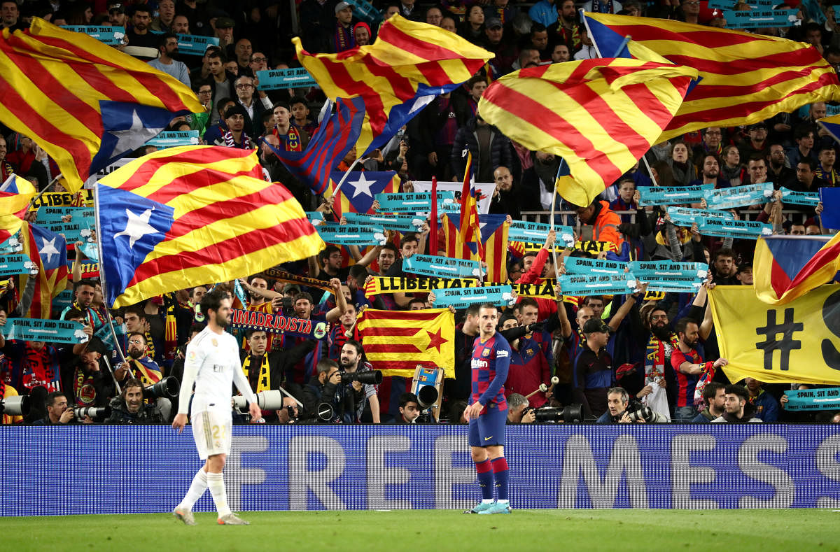 General view as fans inside the stadium wave Estelada flags and hold up banners during the match. (Reuters photo)