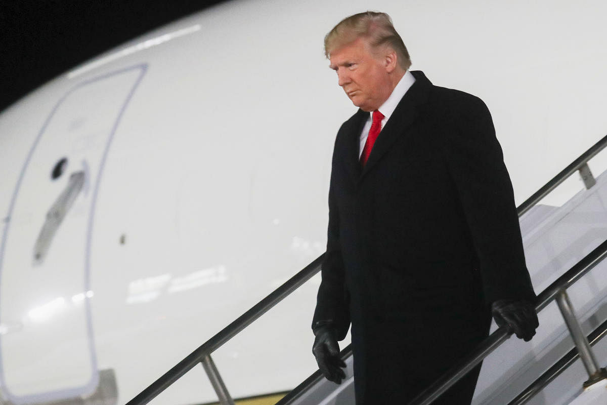 U.S. President Donald Trump disembarks from Air Force One upon arriving at W.K. Kellogg Airport in Battle Creek, Michigan, U.S., December 18, 2019. (Reuters Photo)