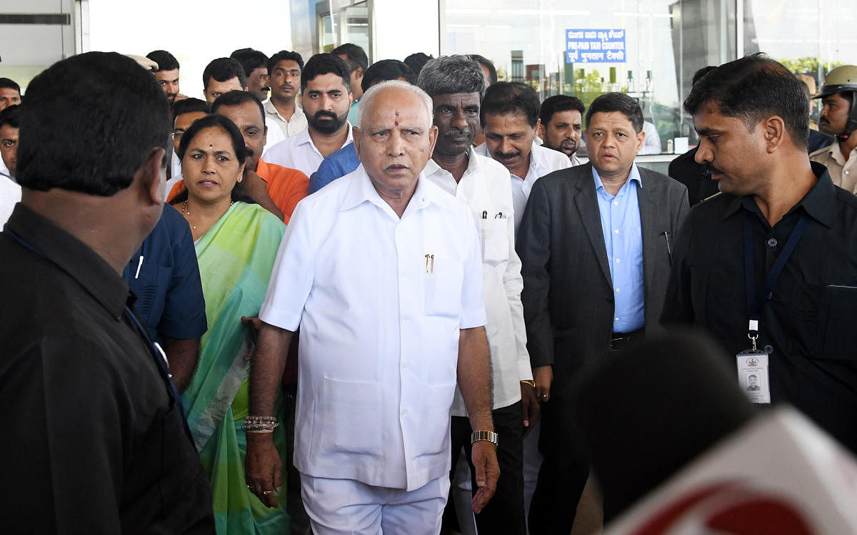 Chief Minister B S Yediyurappa arrives for a meeting with leaders of Muslim and Christian communities at Circuit House on Saturday.
