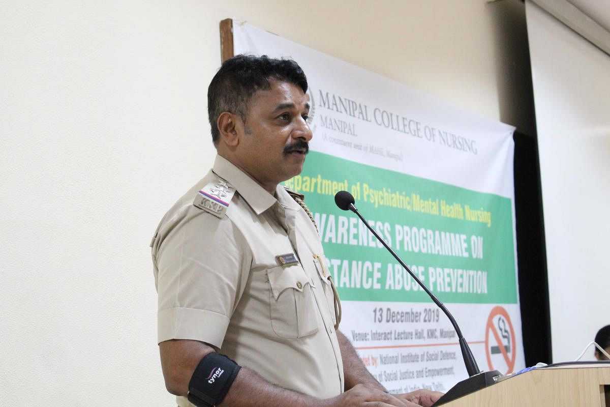 Udupi Circle Inspector Manjunath addresses students on substance abuse at Manipal.