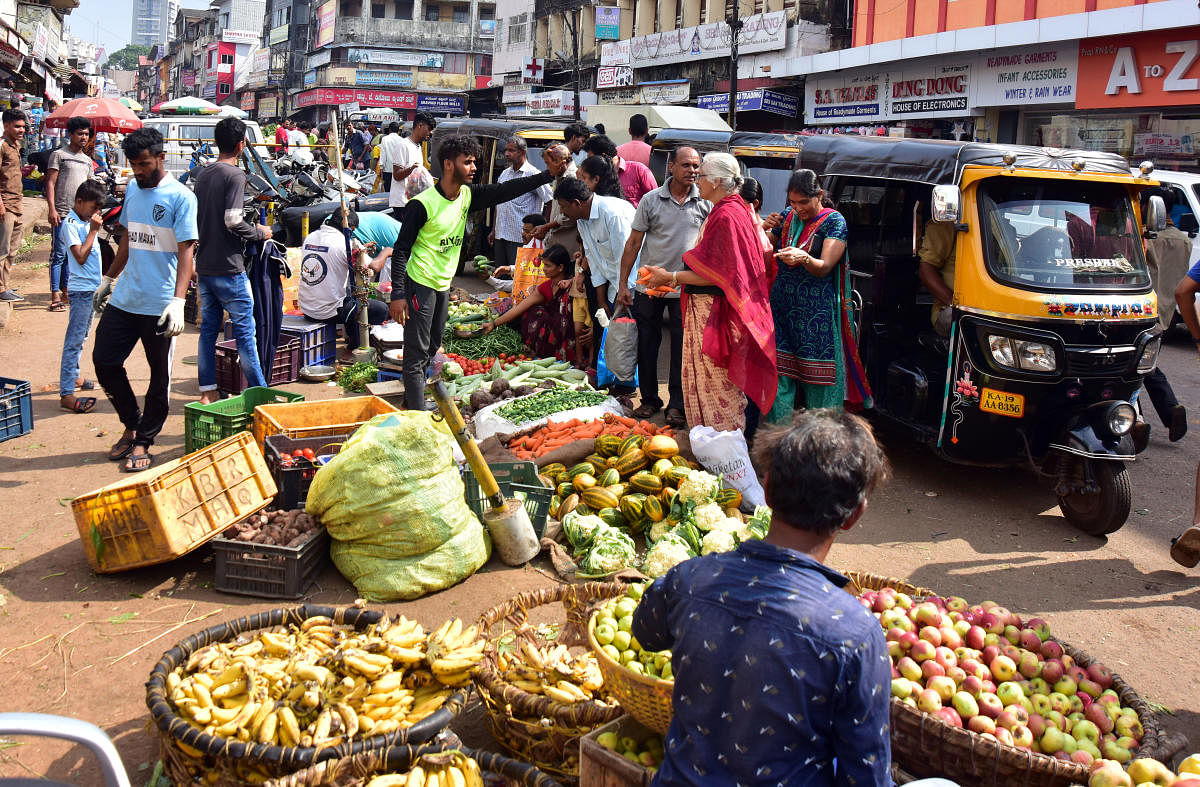 Street vendors sell vegetables and fruits at Central Market in Mangaluru.