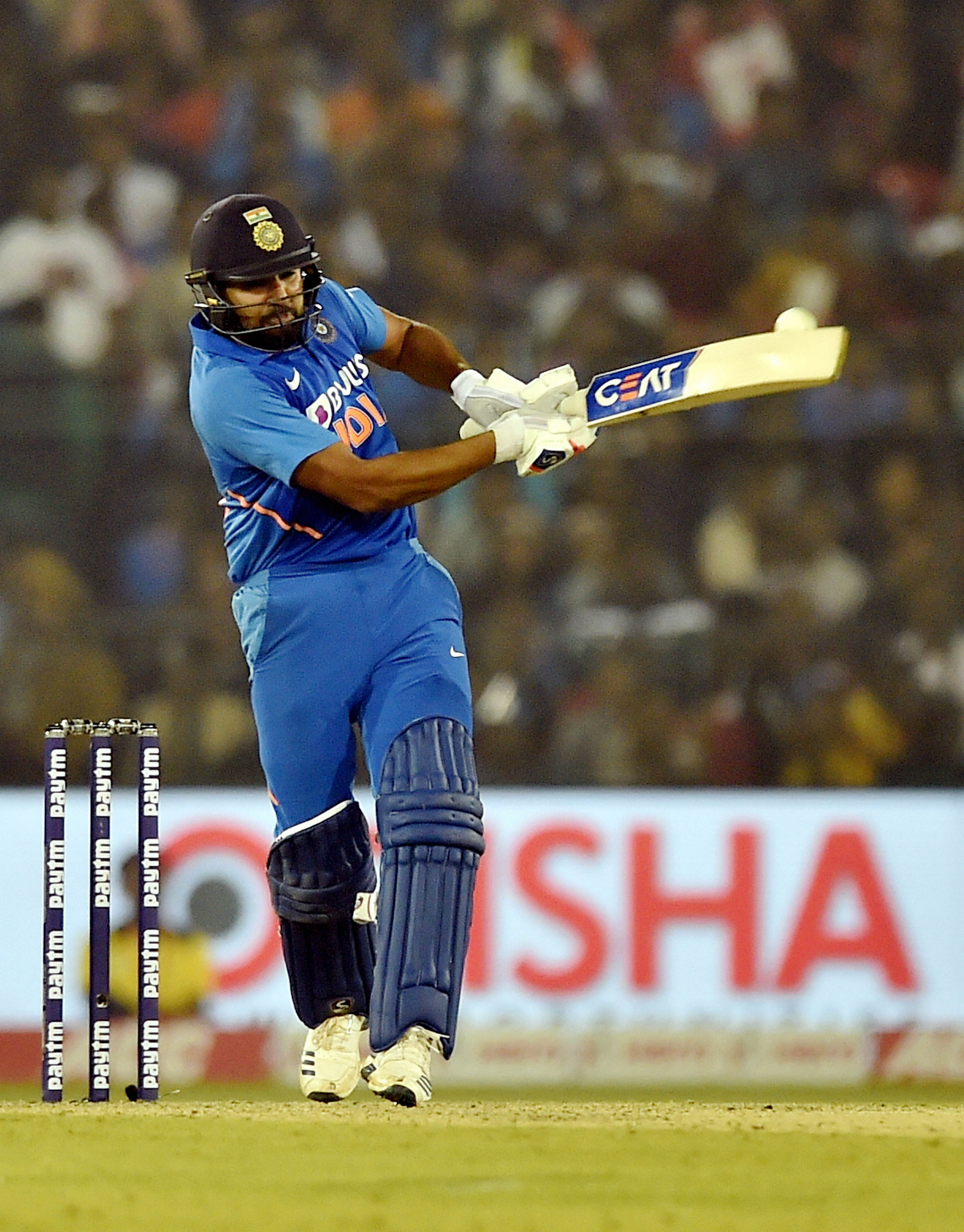 Indian batsman Rohit Sharma plays a shot during the 3rd and final One Day International (ODI) match at Barabati Stadium, in Cuttack. (PTI Photo)