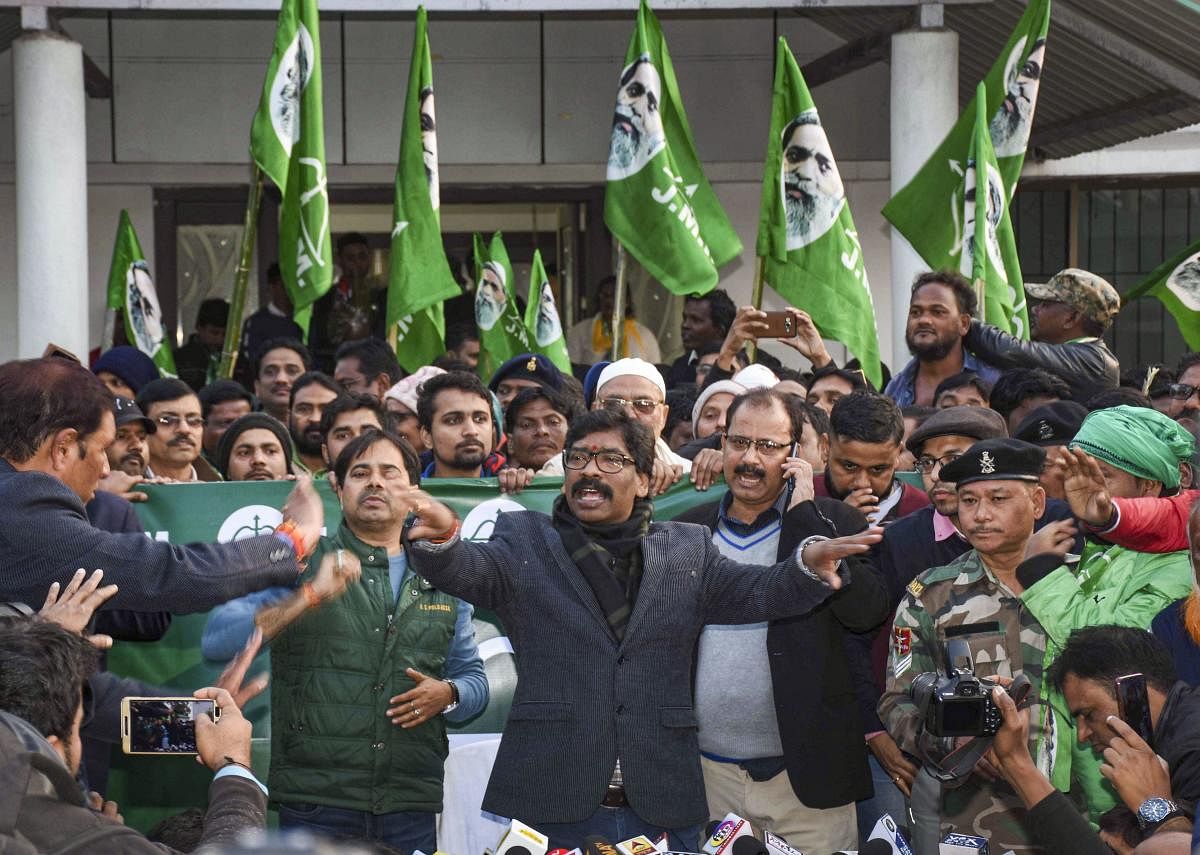 Jharkhand Mukti Morcha (JMM) working president Hemant Soren addresses a press conference as JMM and Congress alliance lead in the Jharkhand Assembly election results. (PTI Photo)