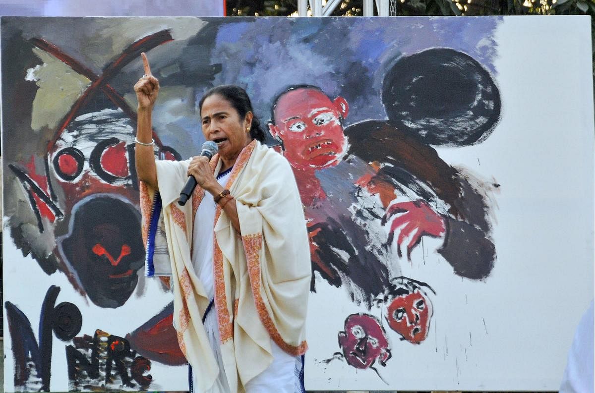 West Bengal CM, Mamata Banerjee addressing a rally in Kolkata. (PTI Photo)