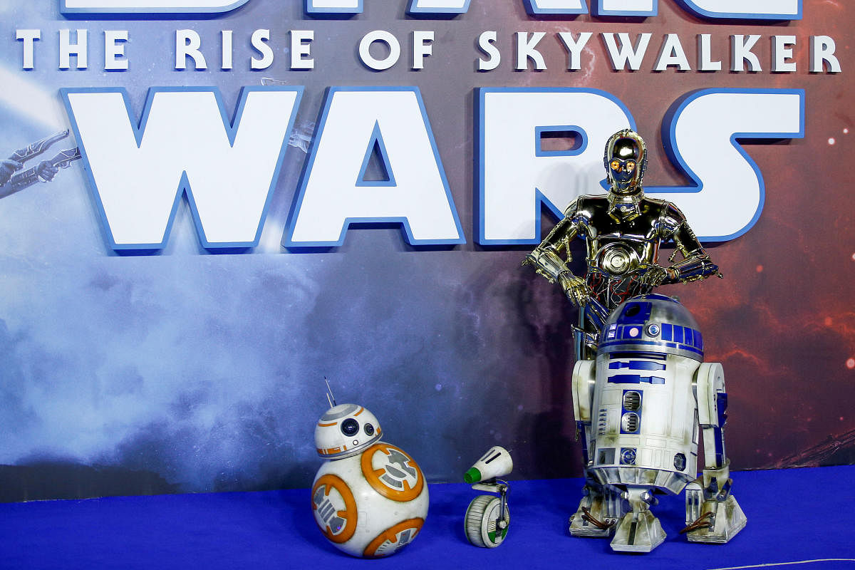 Star Wars robots R2-D2 and BB8 and droids C3P0 and D-0 pose as they attend the premiere of "Star Wars: The Rise of Skywalker" in London. (Reuters Photo)