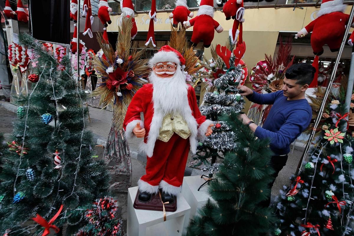 A picture taken on December 18, 2019, shows Christmas decorations on display in Gaza City on December 18, 2019. (Photo by MOHAMMED ABED / AFP)