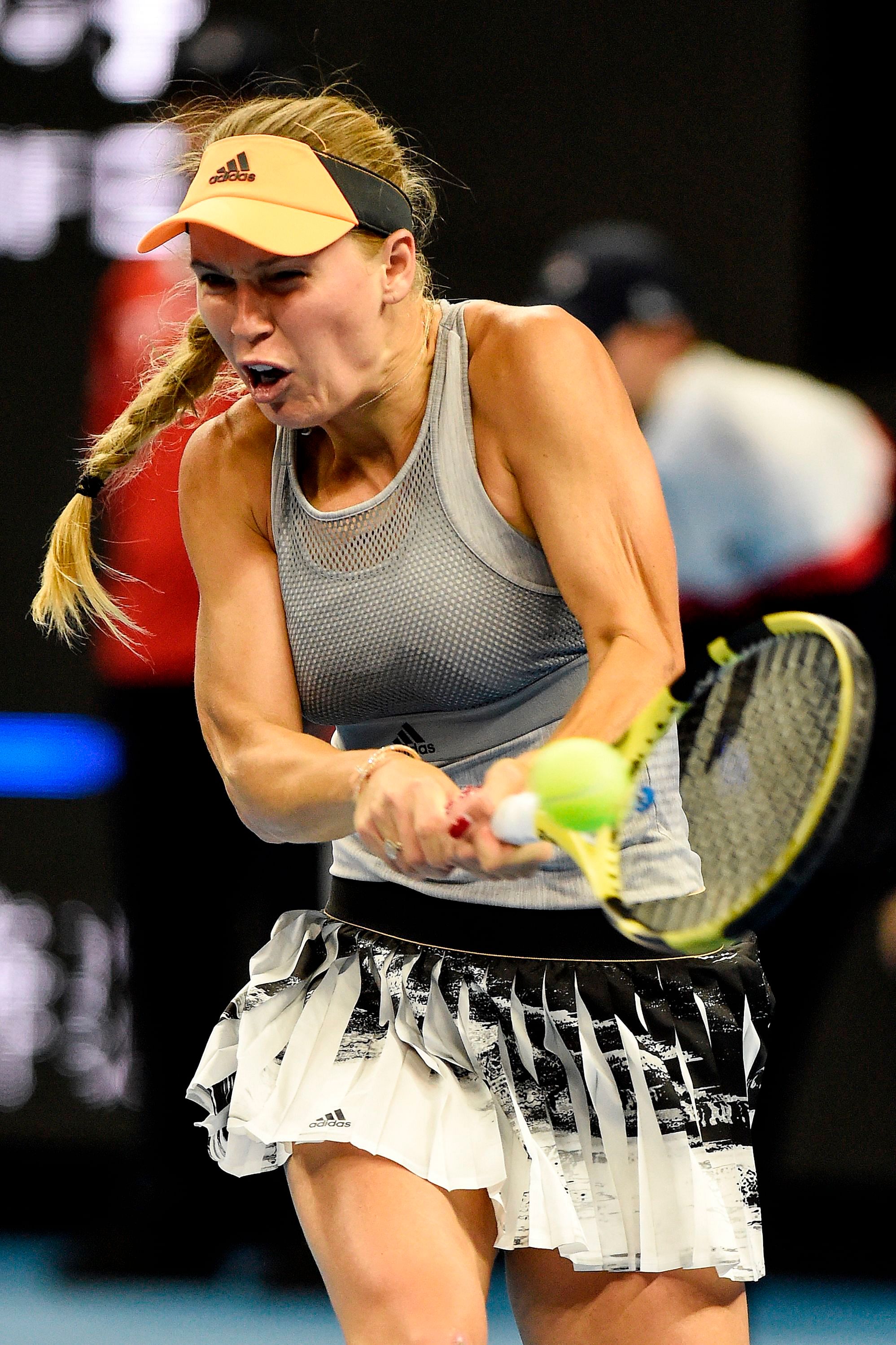 This file photo taken on October 5, 2019 shows Caroline Wozniacki of Denmark hiting a return during her women's singles semi-final match against Naomi Osaka of Japan at the China Open tennis tournament in Beijing. - Caroline Wozniacki will retire from tennis after Australian Open announced the player on December 6, 2019. (Photo by AFP)