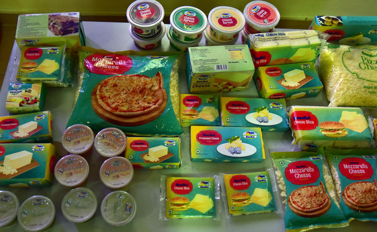 Nandini Shrikhand and cheese, which will be introduced in coastal districts, displayed during the press meet at DKMUL in Kulashekar, Mangaluru, on Monday. DH Photo