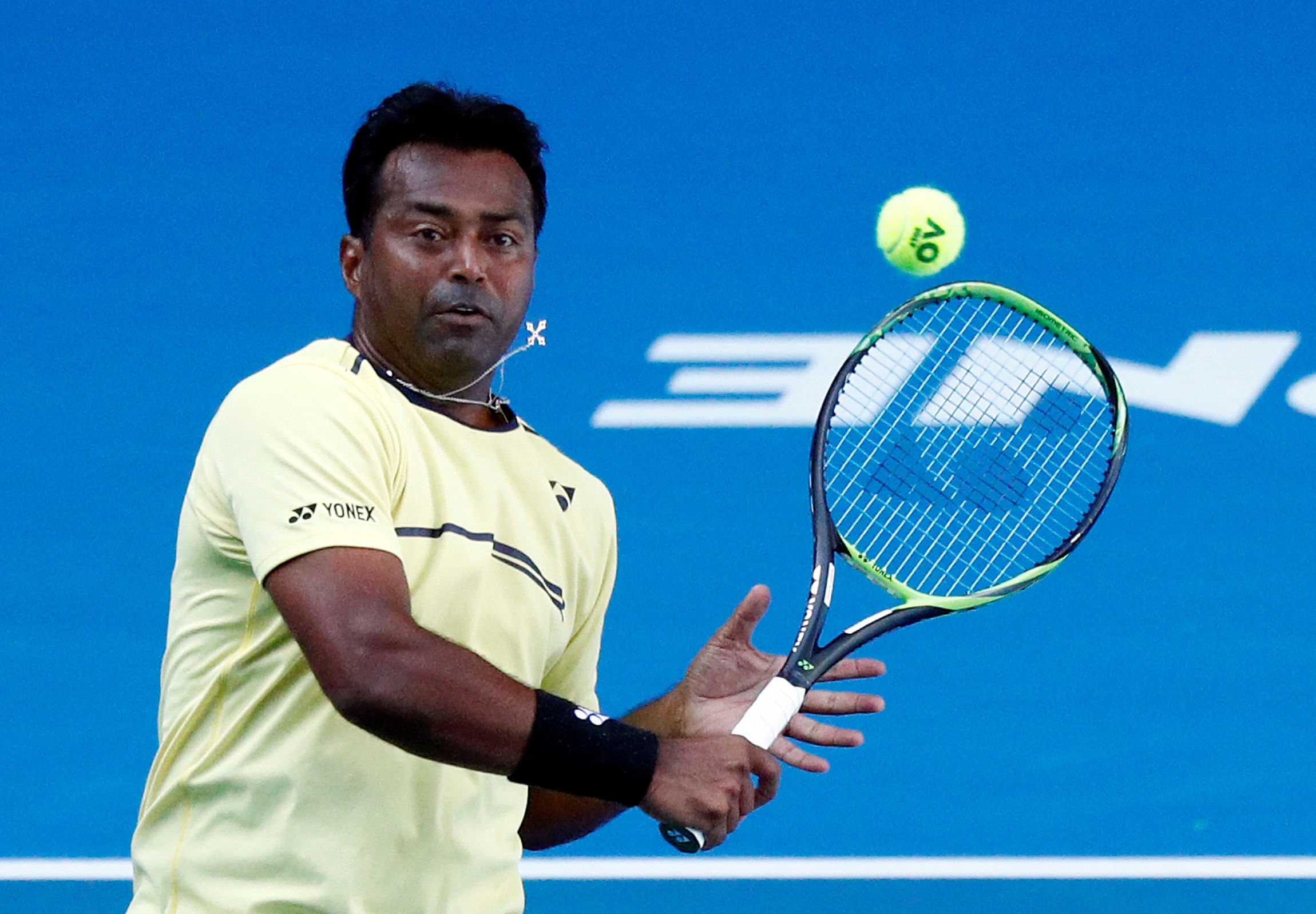 India's Leander Paes in action during the match against Germany's Anna-Lena Groenefeld and Colombia's Robert Farah. (Reuters Photo)