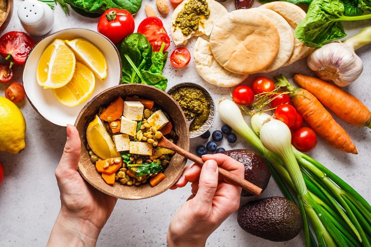 Vegetables, pesto and lentil curry with tofu.(Getty image)