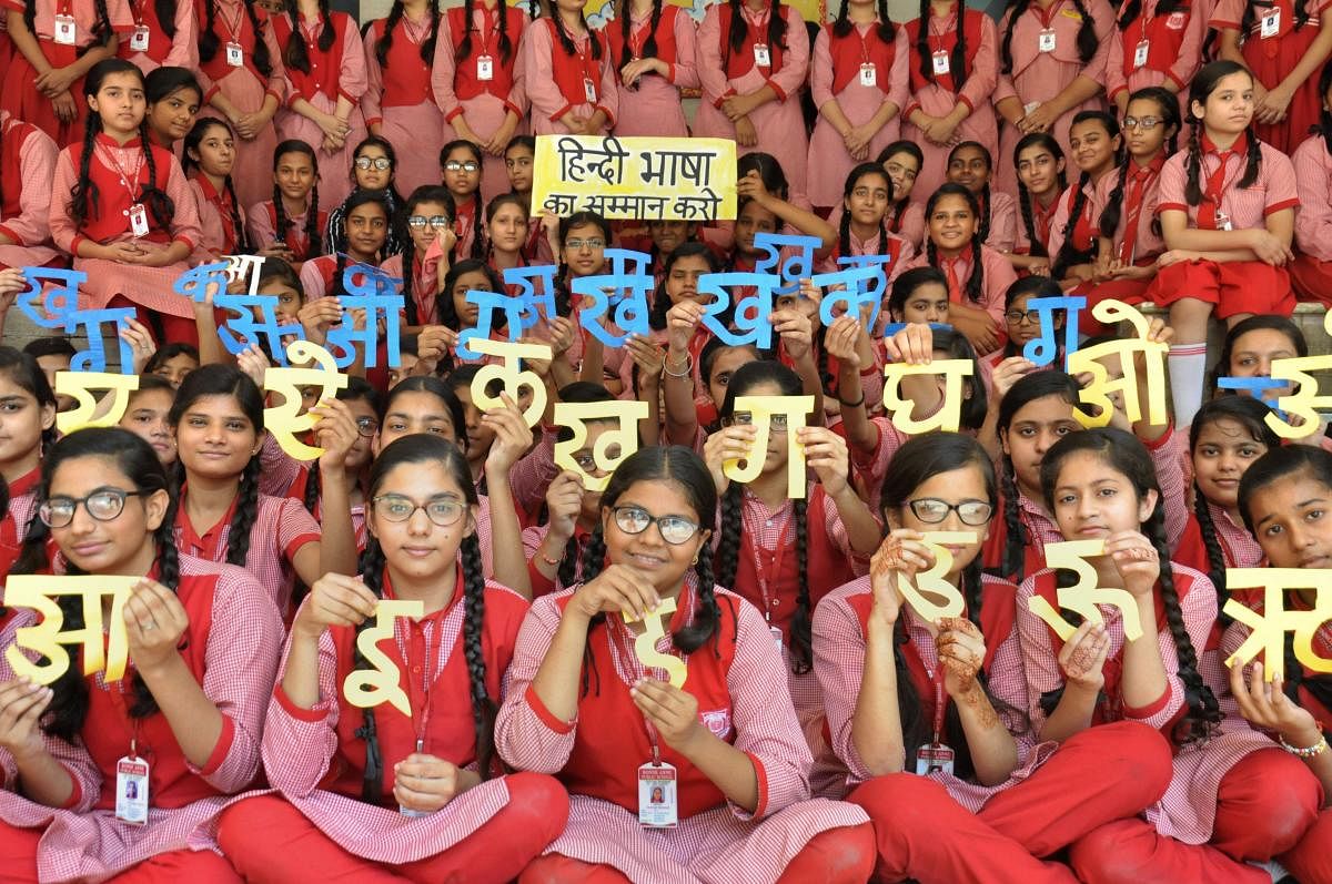 Students participate in a programme to mark 'Hindi Diwas', at a school in Moradabad, on September 14, 2018. PTI