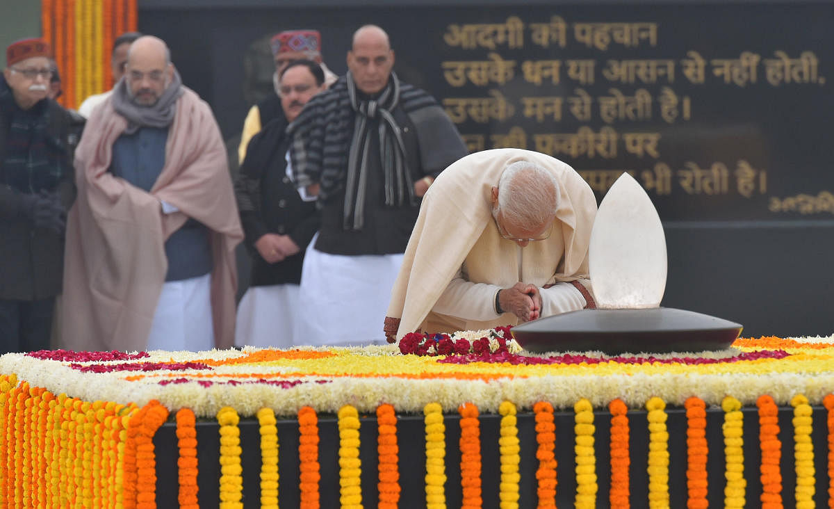 Prime Minister Narendra Modi pays tributes to former prime minister A B Vajpayee on his 95th birth anniversary, in New Delhi. (PTI photo)