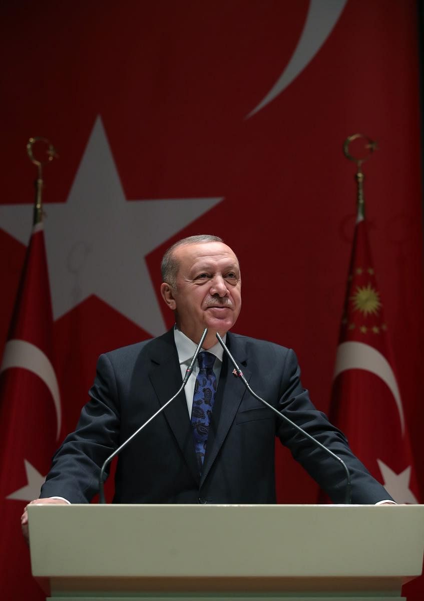 A hand out image made available by the Turkish Presidential Press Service on December 26, 2019, shows Turkey's President Recep Tayyip Erdogan speaking in Ankara. AFP PHOTO /TURKISH PRESIDENTIAL PRESS SERVICE