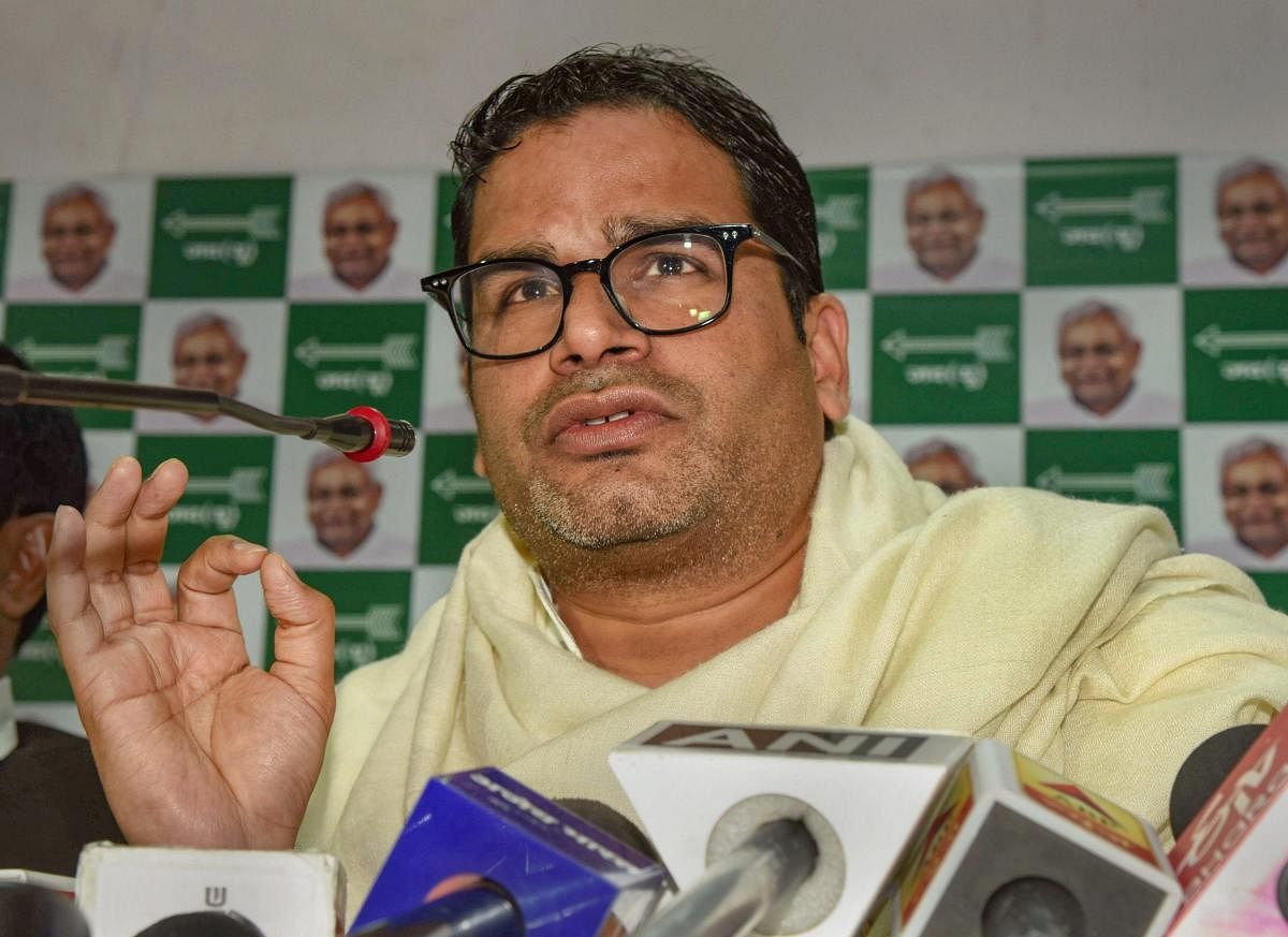 Election strategist and JDU leader Prashant Kishor addresses a press conference at his party office. (PTI Photo)