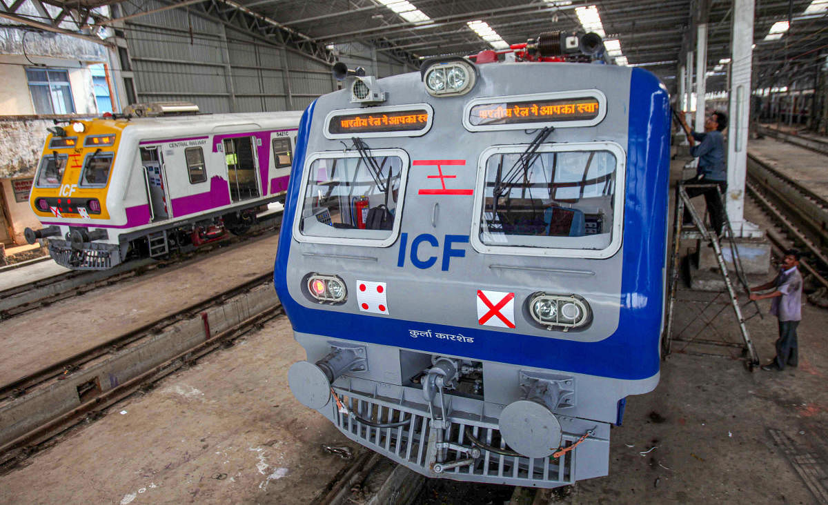 Central Railway’s first air conditioned local train stands parked at the Kurla car shed, in Mumbai, Tuesday, Dec. 10, 2019. (PTI Photo)