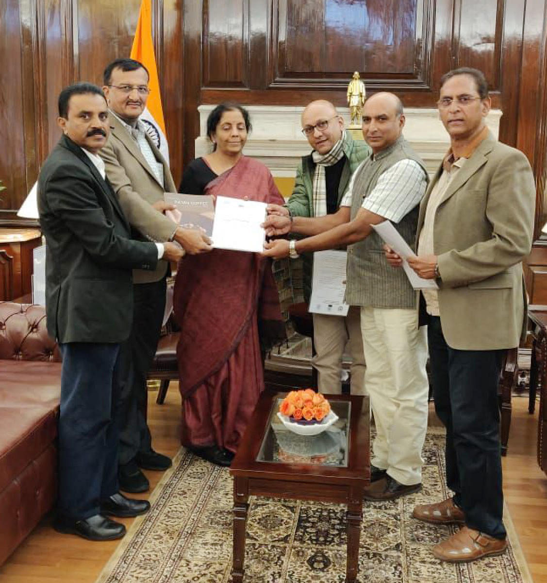 A delegation of coffee growers submits a memorandum to Union Finance Minister Nirmala Sitharaman.