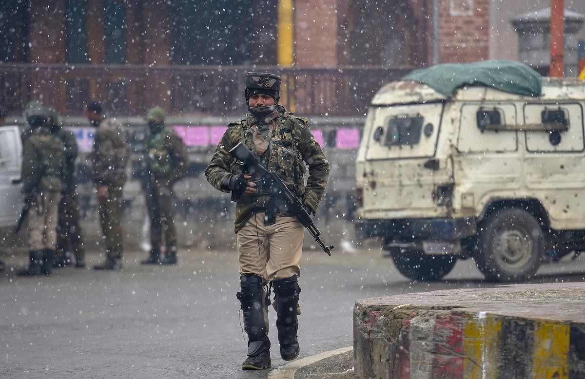 Security personnel in Srinagar (PTI Photo)